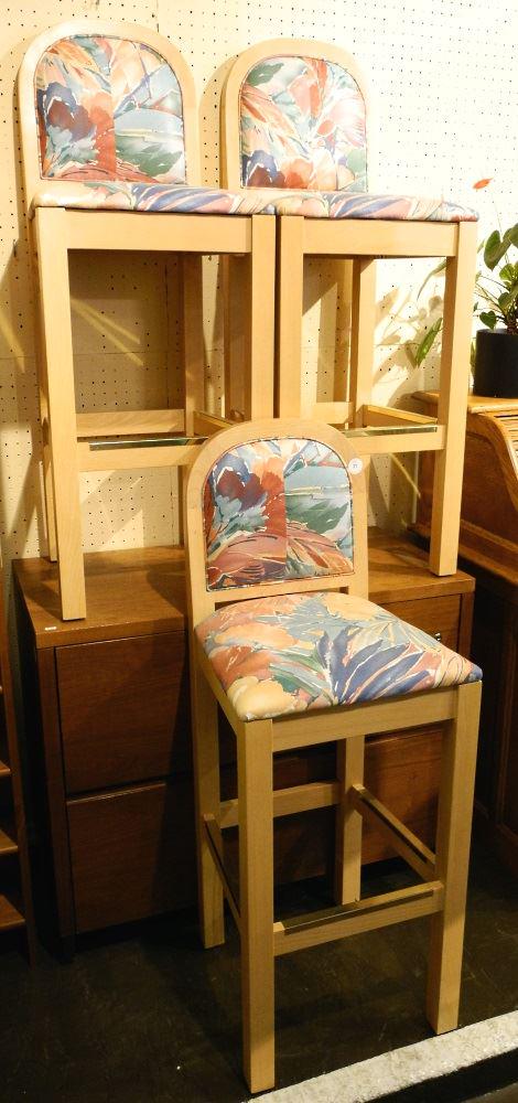 3 Blonde wood high seats.: 3 Blonde wood high seats.