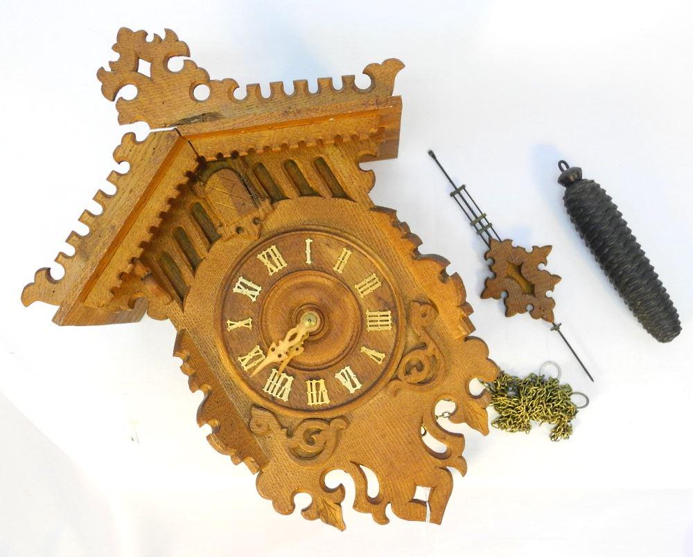 Oak Cuckoo Clock with Weights & Pendulum, 16 3/4" high. (1 of 3)