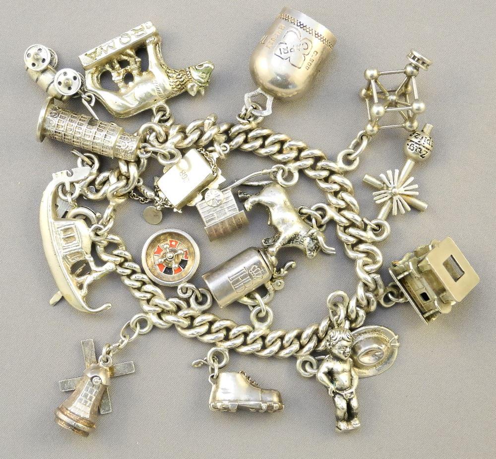 Silver Charm Bracelet with Charms of Various Silver: Silver Charm Bracelet with Charms of Various Silver Standards.