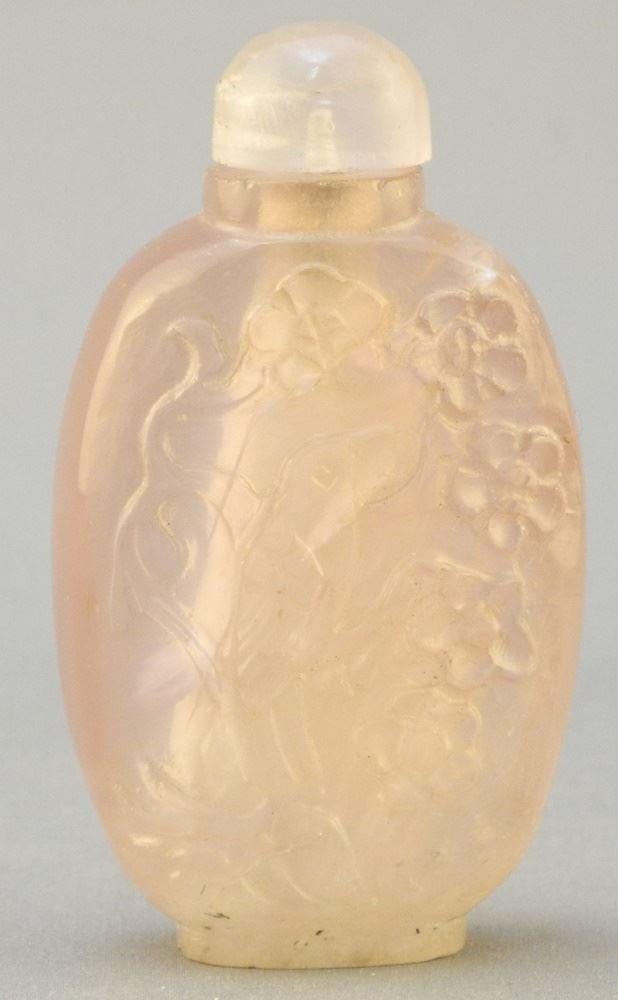 Rose quartz snuff bottle carved with relief bird (1 of 2)