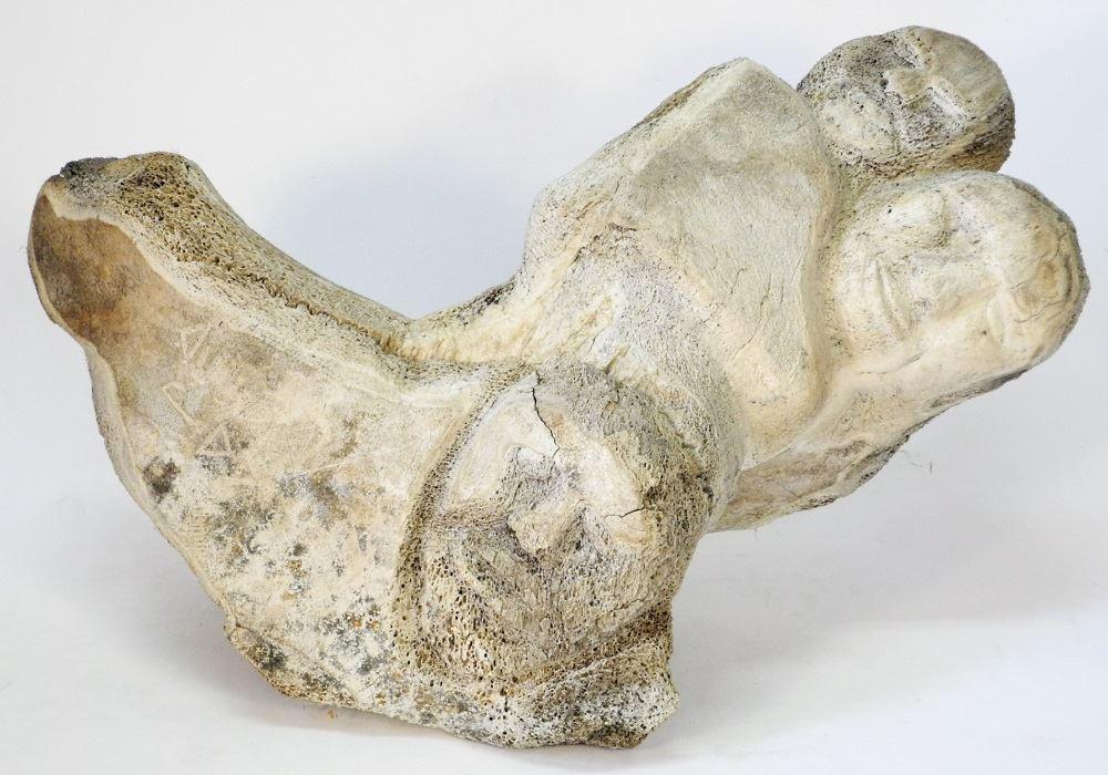 Whale Bone Carving Attributed to Louise Angugatsiark: Whale Bone Carving Attributed to Louise Angugatsiark Tungilik, 26" wide.