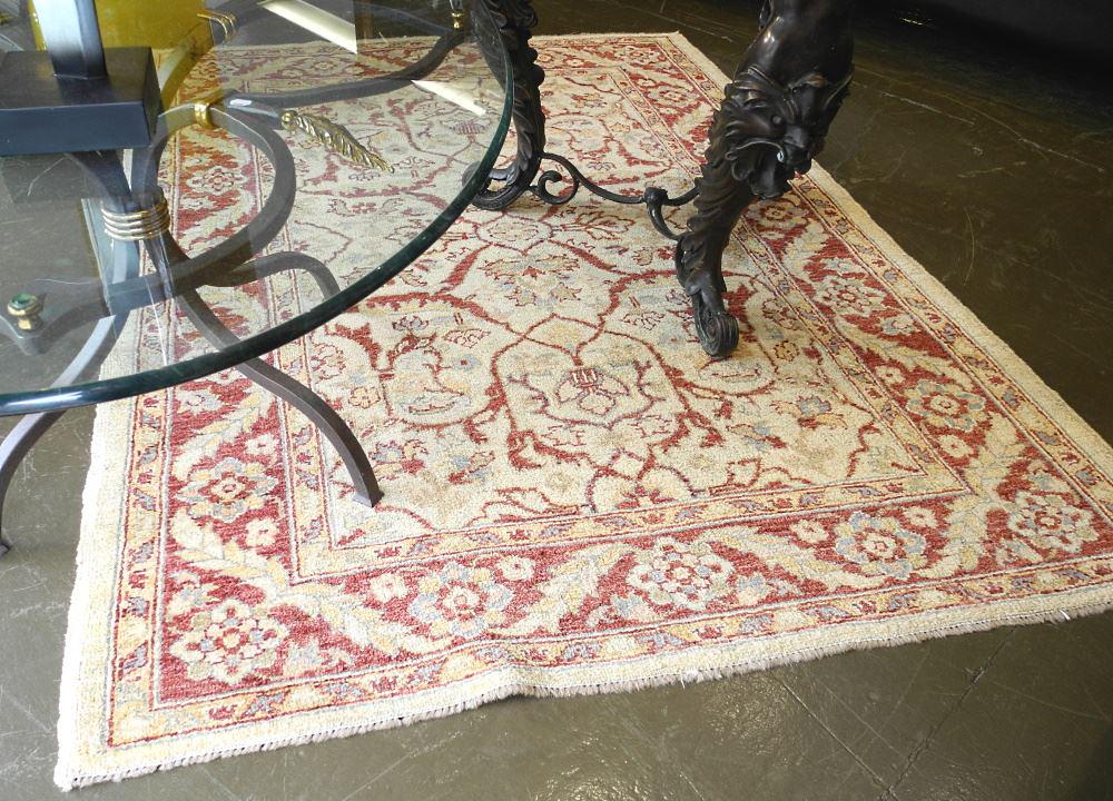 Hand Knotted Persian Carpet approximately 4'4" x 6'11". (1 of 3)