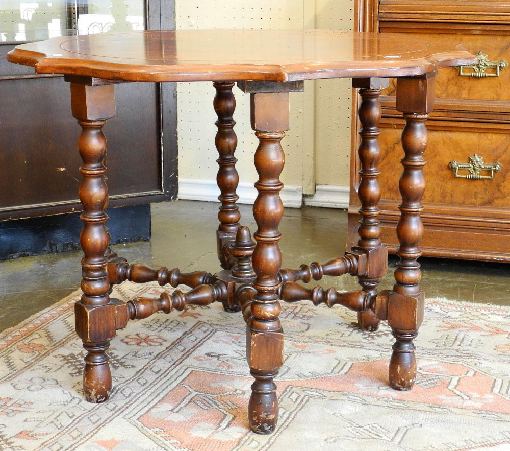 Shaped Top Coffee Table with Turned Legs, 28" across. (1 of 2)