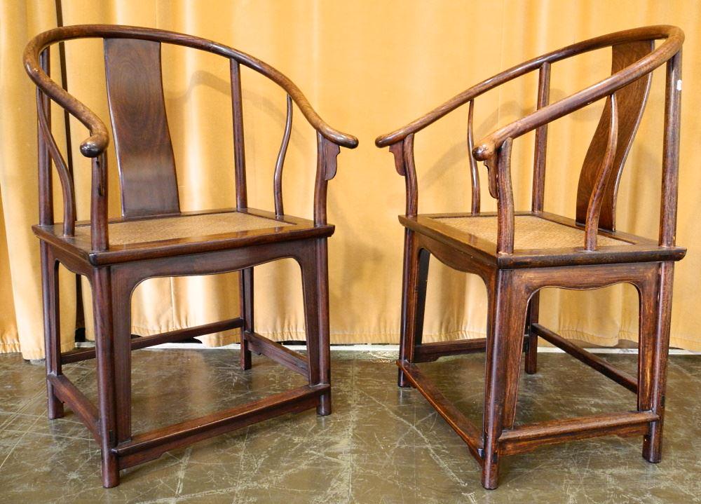 Pair of Rosewood Horseshoe Back Chairs 26" wide,: Pair of Rosewood Horseshoe Back Chairs 26" wide, acquired Hong Kong.
