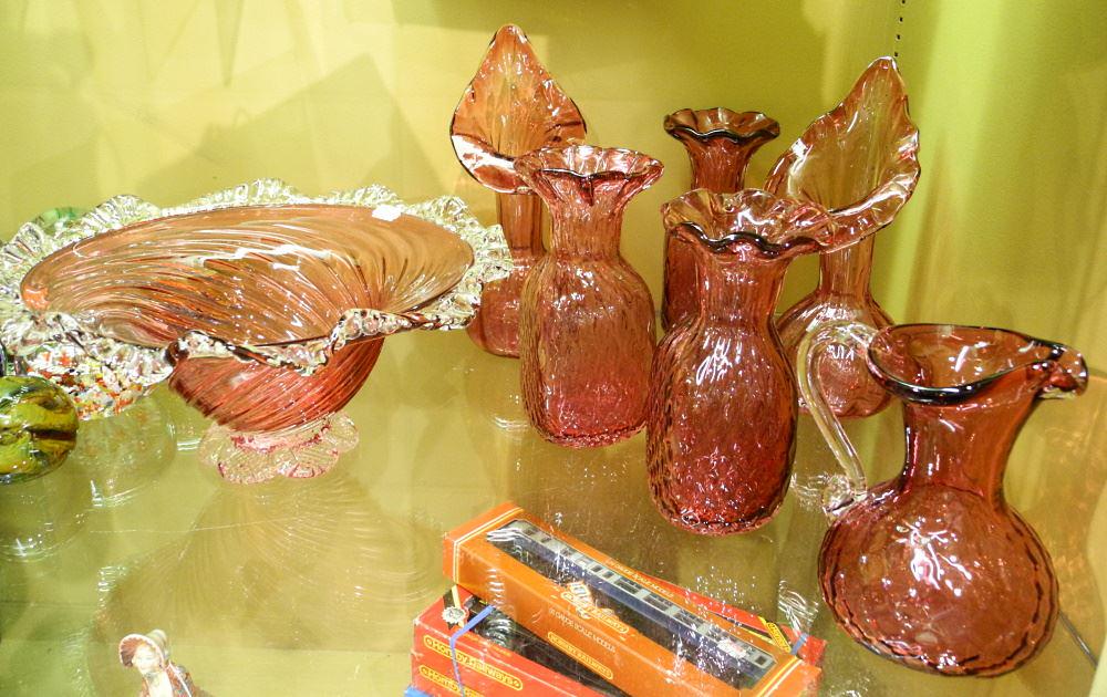 7 Pieces of Cranberry Glass, 5 1/2" - 9 1/2" high. (1 of 2)