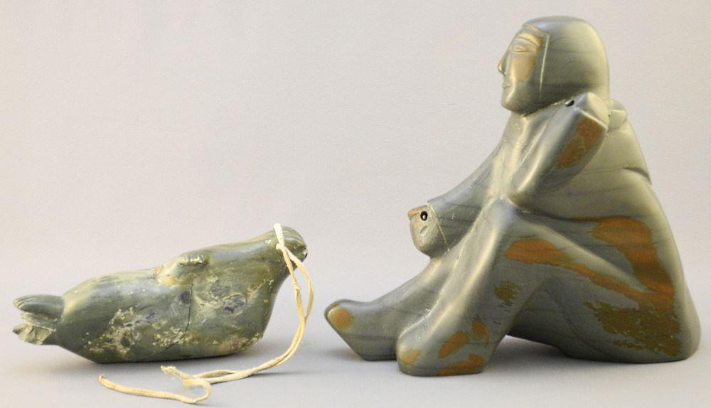 2 Inuit Carved Stone Pieces, Seal & Hunter, 7" high. (1 of 3)