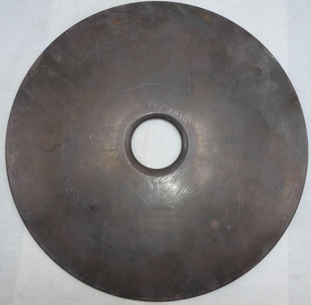 Large Dark Stone Repelling Disc, 12" diameter, 20th C.: Large Dark Stone Repelling Disc, 12" diameter, 20th C.