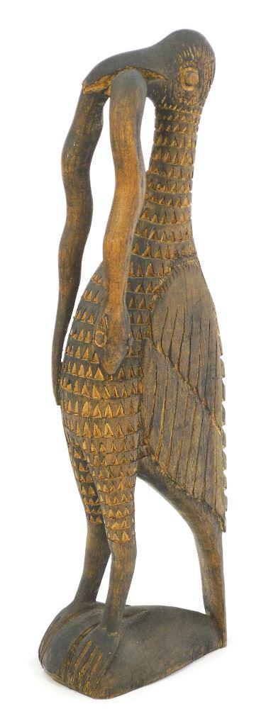 Papua New Guinea Carved Bird with Eel By Plasus Asapi,: Papua New Guinea Carved Bird with Eel By Plasus Asapi, 22 1/4" high.