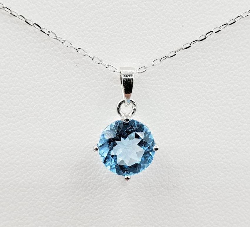 Sterling Silver & Blue Topaz Pendant with Sterling Silver Chain. (1 of 3)