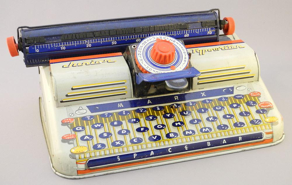Lithograph Toy Tin Typewriter, "Junior", 11 1/2" Length. (1 of 2)