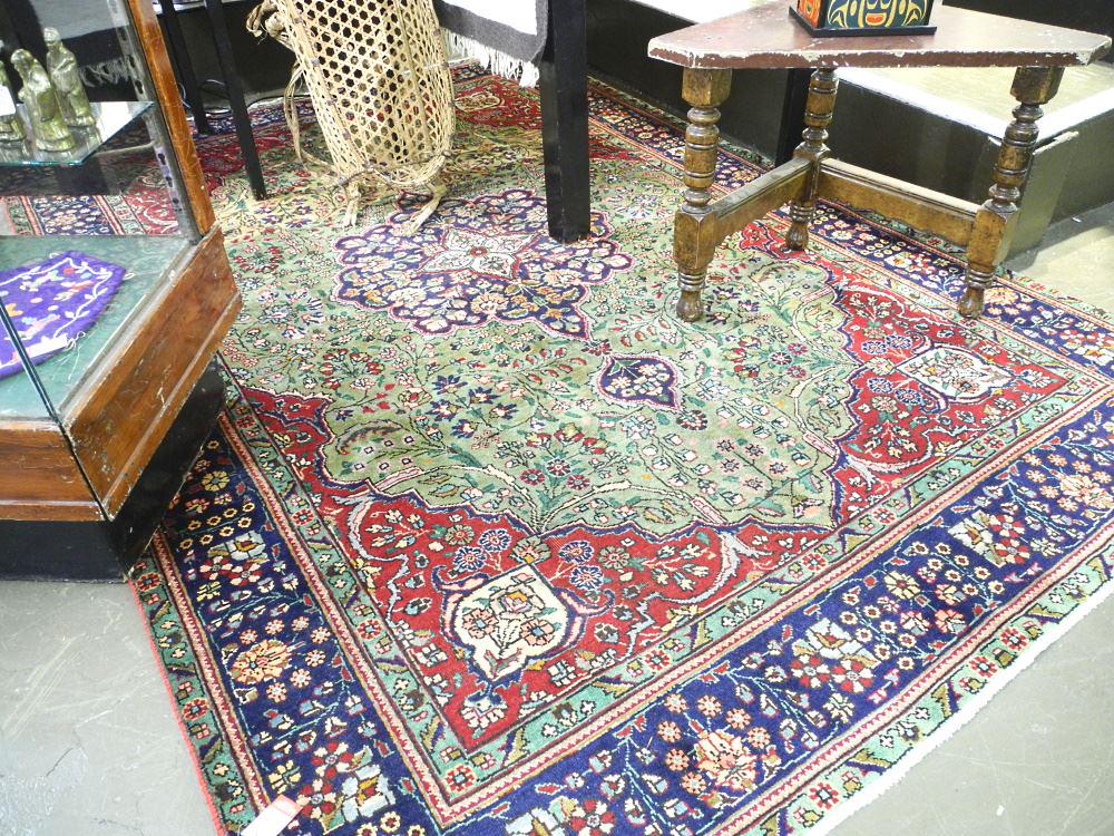 Tabriz Carpet, Approximately 10'2" x 6'10". (1 of 3)