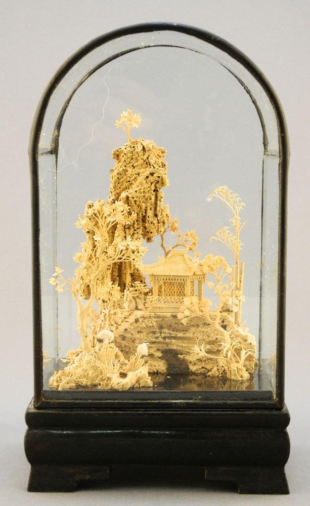 Asian cork art under glass.: Asian cork art under glass.