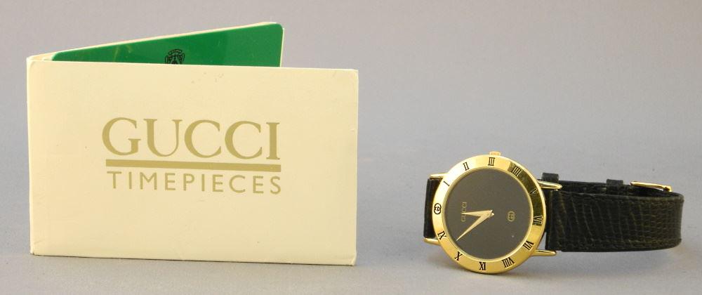 Gent's Gucci Wristwatch with Quebec Warranty Card, Serial 0190664 (1 of 5)