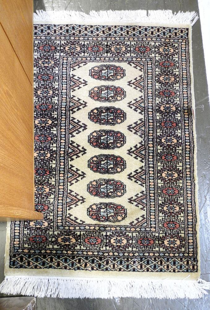 Sand-Tone Bokhara Mat, Approximately 40" x 25 1/2". (1 of 2)