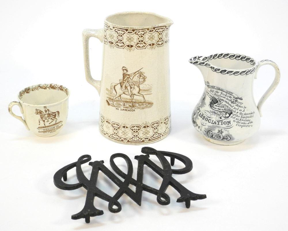 Collection of: 2 Pitchers/ 1 Teacup & a Metal Trivet with William III, Largest 7 1/2".: Collection of: 2 Pitchers/ 1 Teacup & a Metal Trivet with William III, Largest 7 1/2".