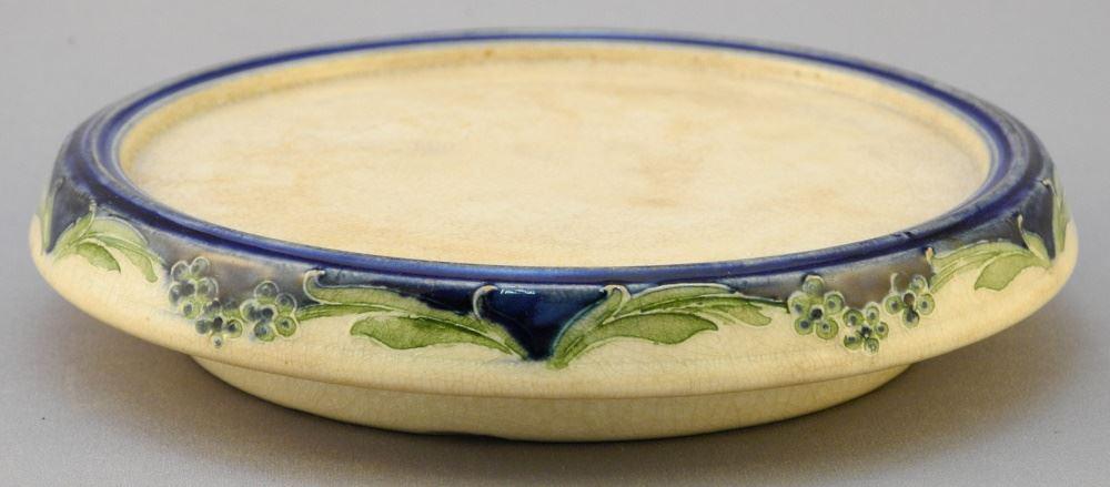Macintyre Trivet, 5 1/4" diameter, crazing noted.: Macintyre Trivet, 5 1/4" diameter, crazing noted.