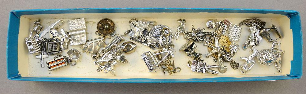 Sterling Silver Charm Collection, 42 Charms, TW:97.9 Grams. - (1 of 1)