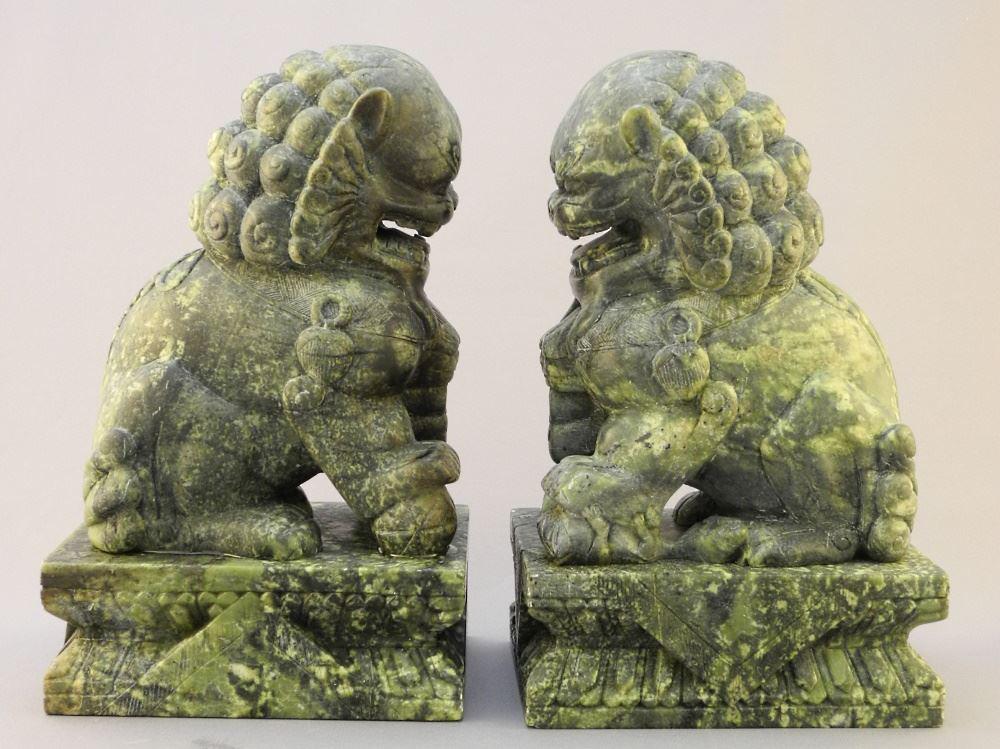 Pair of Carved Green Soft Stone Buddhist Lion Dogs, 1 Paw Chipped, 8 1/2" x 4" x 5 1/2".: Pair of Carved Green Soft Stone Buddhist Lion Dogs, 1 Paw Chipped, 8 1/2" x 4" x 5 1/2".