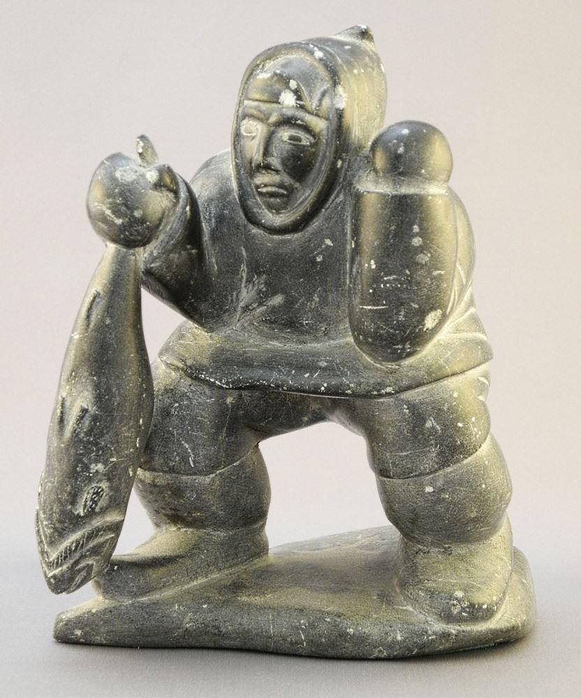 Inuit Stone Sculpture of a Fisherman, 6 7/8".: Inuit Stone Sculpture of a Fisherman, 6 7/8".