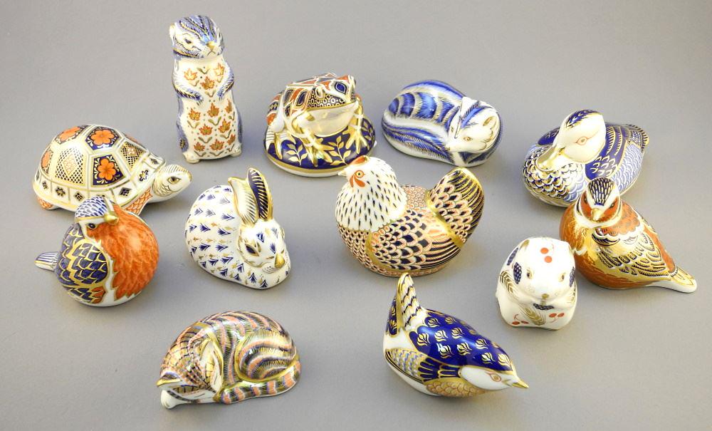 Collection of Royal Drown Derby Figurines, tallest 4 1/4". (1 of 4)