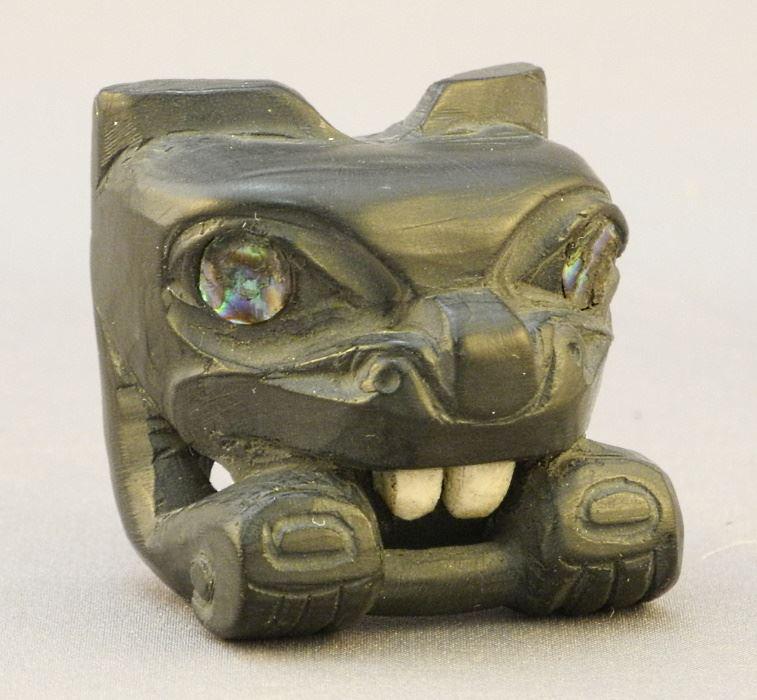 Haida Argillite Pendant monogrammed KL, Inset Teeth & Eyes, 1 3/8" High.: Haida Argillite Pendant monogrammed KL, Inset Teeth & Eyes, 1 3/8" High.