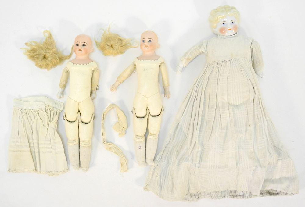 3 Early Dolls with Porcelain Heads. (1 of 3)