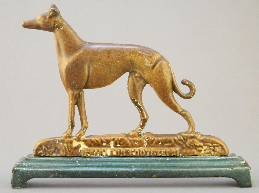 Antique "Fearless Footsteps" Cast Iron Door Stop, 10 3/4" Wide.: Antique "Fearless Footsteps" Cast Iron Door Stop, 10 3/4" Wide.