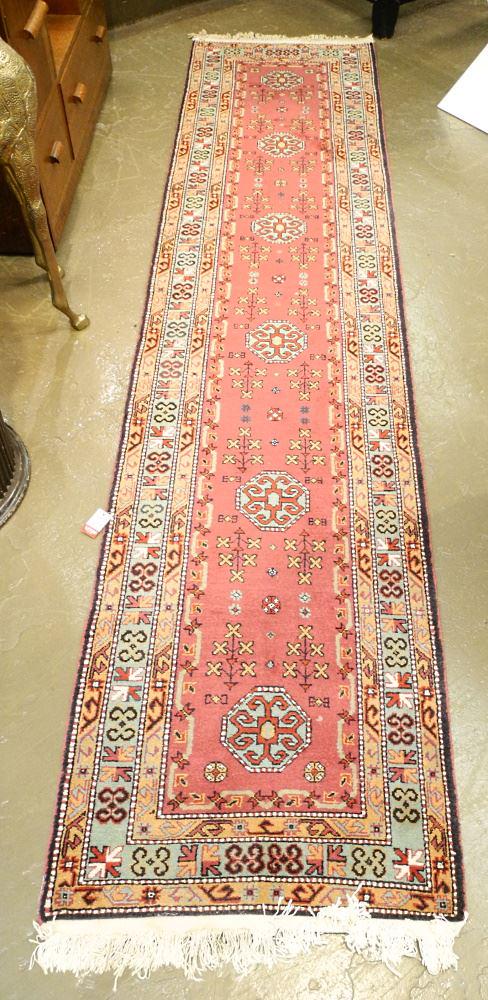 Hand Knotted Persian Runner, Approximately 11' x 2'. (1 of 3)