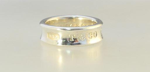 Tiffany & Co. 925 (Marked) Silver "1897 - 1997" Ring, 7.9 Grams Size 7 1/4.: Tiffany & Co. 925 (Marked) Silver "1897 - 1997" Ring, 7.9 Grams Size 7 1/4.