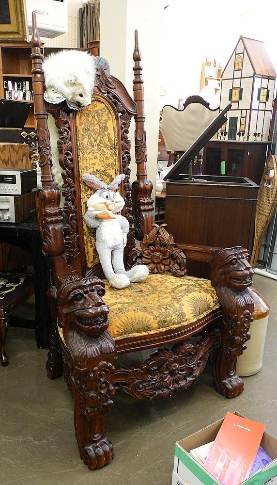 Southeast Asian Deep Carved "Lion Throne" Chair (restoration noted).: Southeast Asian Deep Carved "Lion Throne" Chair (restoration noted).