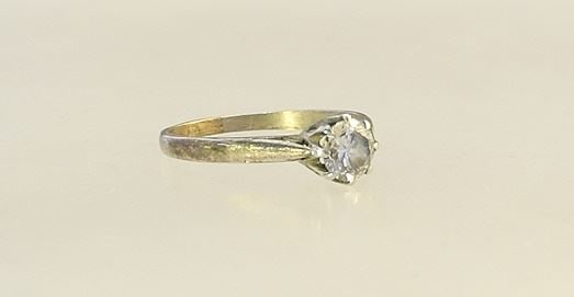 Diamond Solitaire Ring, in unmarked setting, size 6 3/4", 1.49 grams.: Diamond Solitaire Ring, in unmarked setting, size 6 3/4", 1.49 grams.