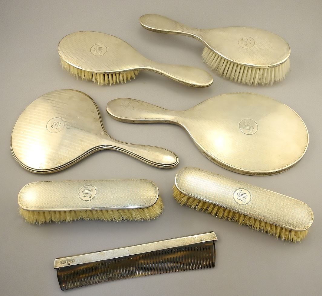 Collection of Sterling Dressing Table Items; 5 Brushes & Comb, 2 Mirrors, appr.1100 grams. (1 of 7)