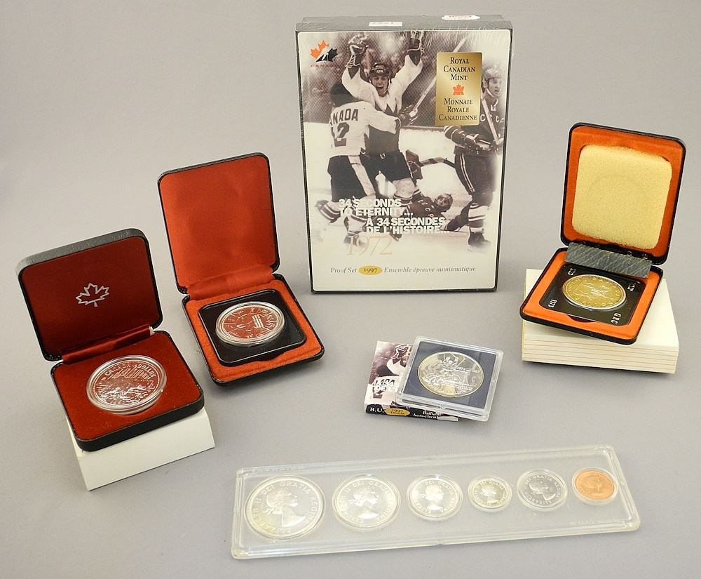 4 Various Canadian Silver Dollars & 1997 "34 Seconds" Proof Set. (1 of 3)