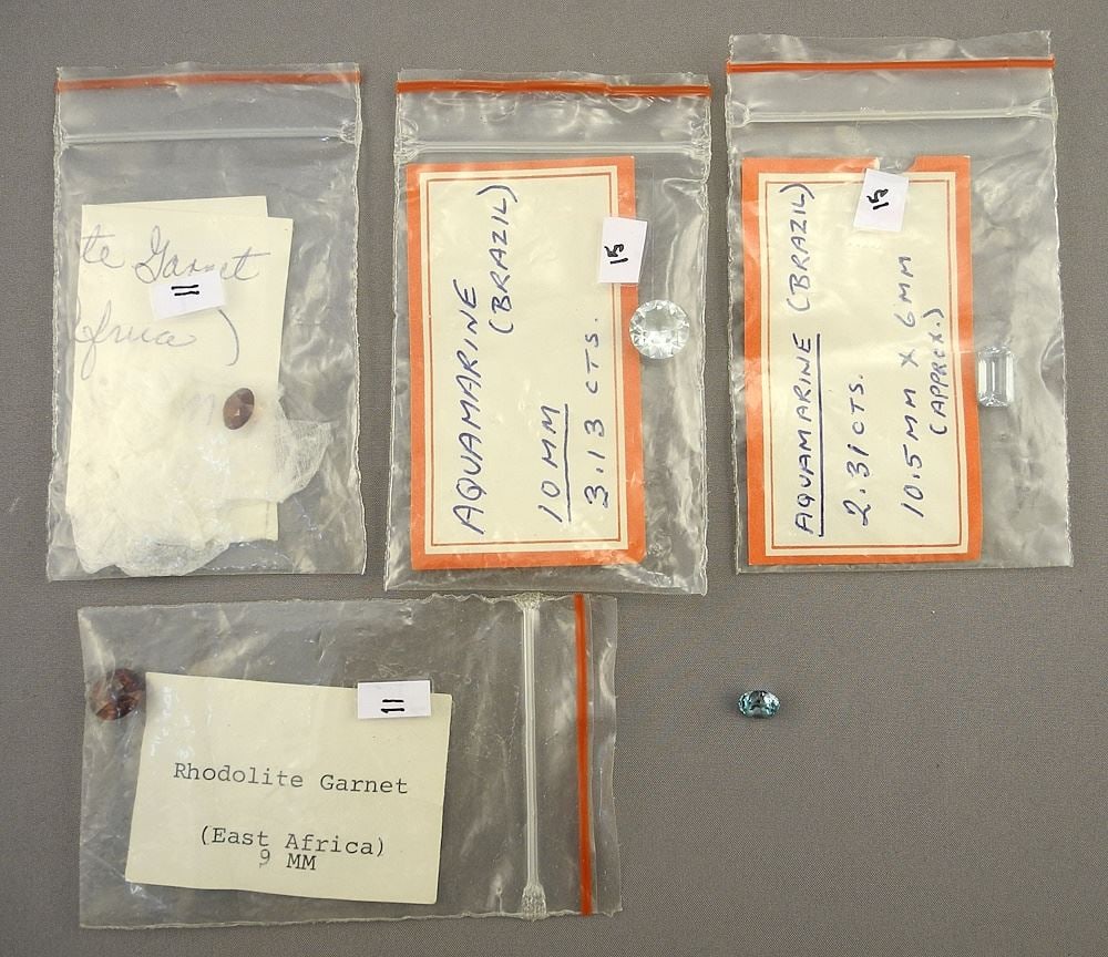 Collection of Unset Stones: Topaz / 2 Aquamarines / 2 Garnets (11/15/16) (1 of 3)