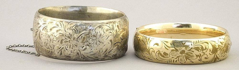 Two Hinged Cuff Bracelets: Sterling (50.79 gr. 2 3/4" W.) & Gold Tone (41.25 gr. 2 3/4" W.): Two Hinged Cuff Bracelets: Sterling (50.79 gr. 2 3/4" W.) & Gold Tone (41.25 gr. 2 3/4" W.)