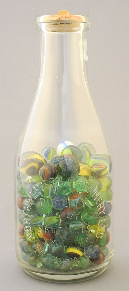 Northwestern Creamery Victoria BC Milk Bottle & Marbles.: Northwestern Creamery Victoria BC Milk Bottle & Marbles.