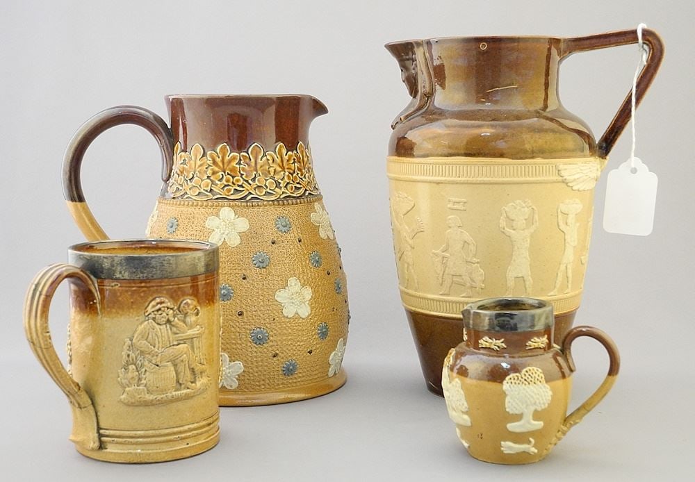 6 Doulton & Doulton Lambeth Pottery Jugs & a Mug.: 6 Doulton & Doulton Lambeth Pottery Jugs & a Mug.