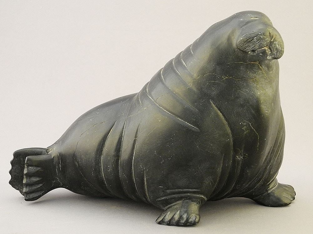 Inuit Stone Sculpture signed E9-1595 , 8 3/4"L, "Walrus" (no tusks, chip noted). (1 of 4)
