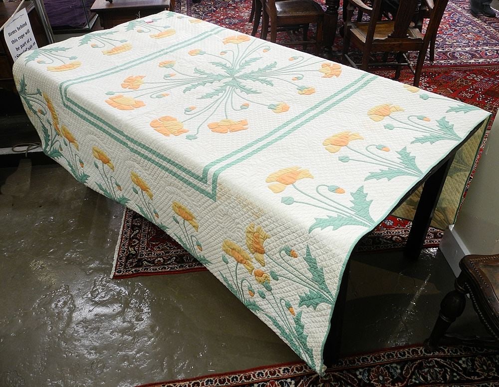 Patchwork Quilt, Approximately 7'1" x 6'1" (mild discoloration noted).: Patchwork Quilt, Approximately 7'1" x 6'1" (mild discoloration noted).