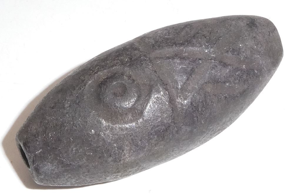 Sino-Tibetan Black Asteroid Stone Bead, 19th C., 3 1/4"L.: Sino-Tibetan Black Asteroid Stone Bead, 19th C., 3 1/4"L.