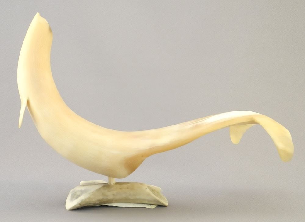Muskox Horn Inuit Sculpture signed Migiyok, 12"L, "Beluga Whale".: Muskox Horn Inuit Sculpture signed Migiyok, 12"L, "Beluga Whale".