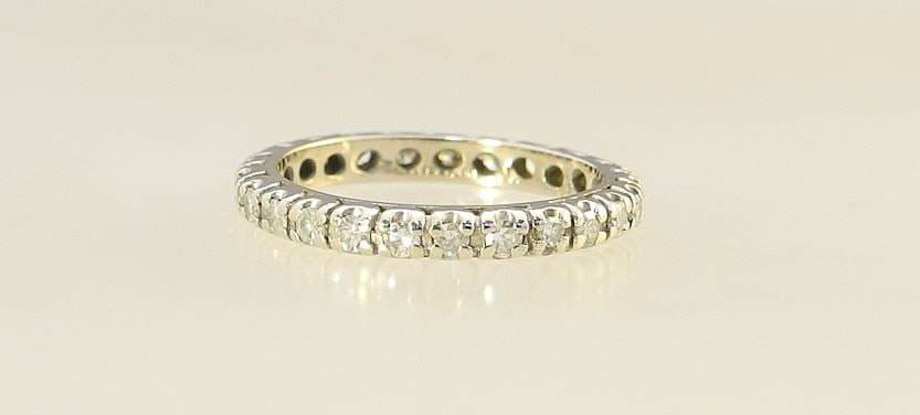14K (marked) White Gold Diamond Eternity Band, Size 7 1/2, 3.04g.: 14K (marked) White Gold Diamond Eternity Band, Size 7 1/2, 3.04g.