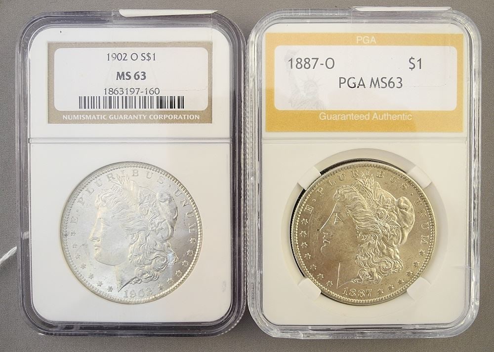 Two Graded Morgan Dollars: 1887 & 1902.: Two Graded Morgan Dollars: 1887 & 1902.