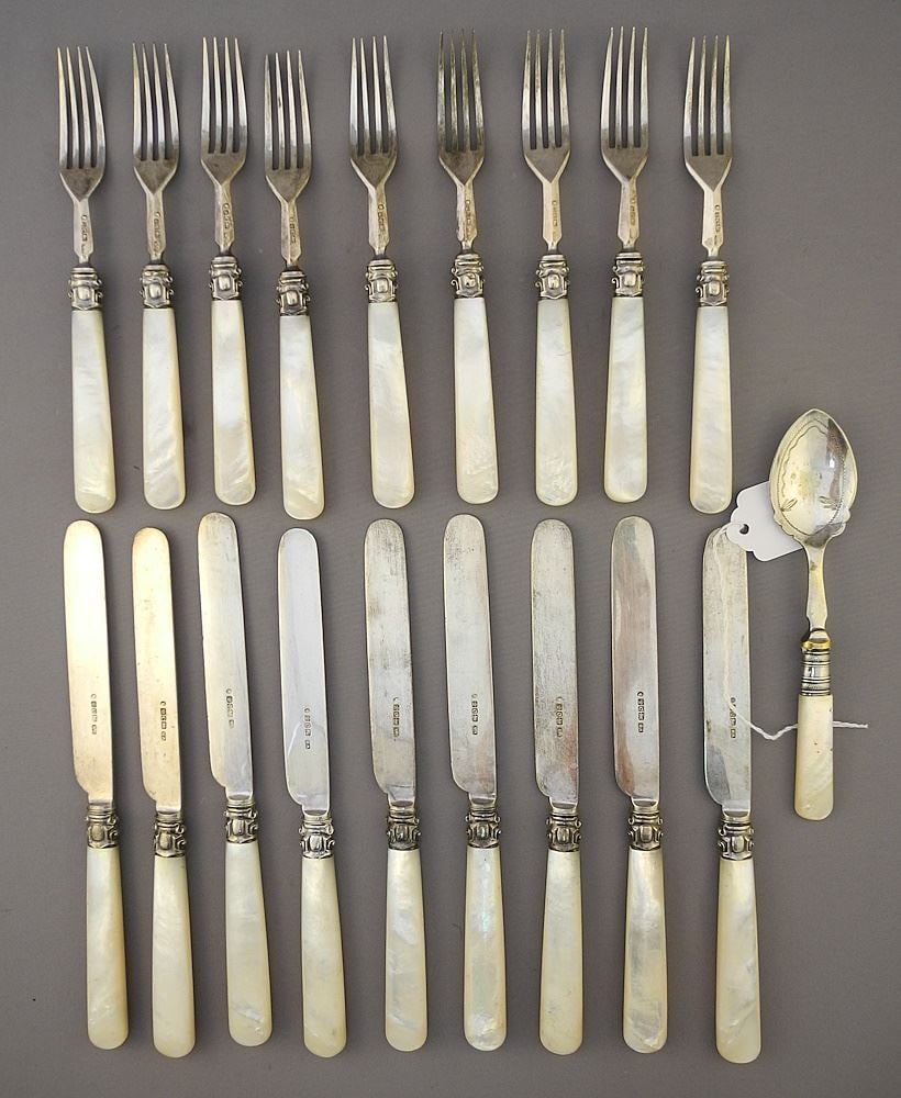 9 Hallmarked Silver Fruit Knives & Forks with Mother of Pearl Handles & Plated Sugar Spoon.: 9 Hallmarked Silver Fruit Knives & Forks with Mother of Pearl Handles & Plated Sugar Spoon.