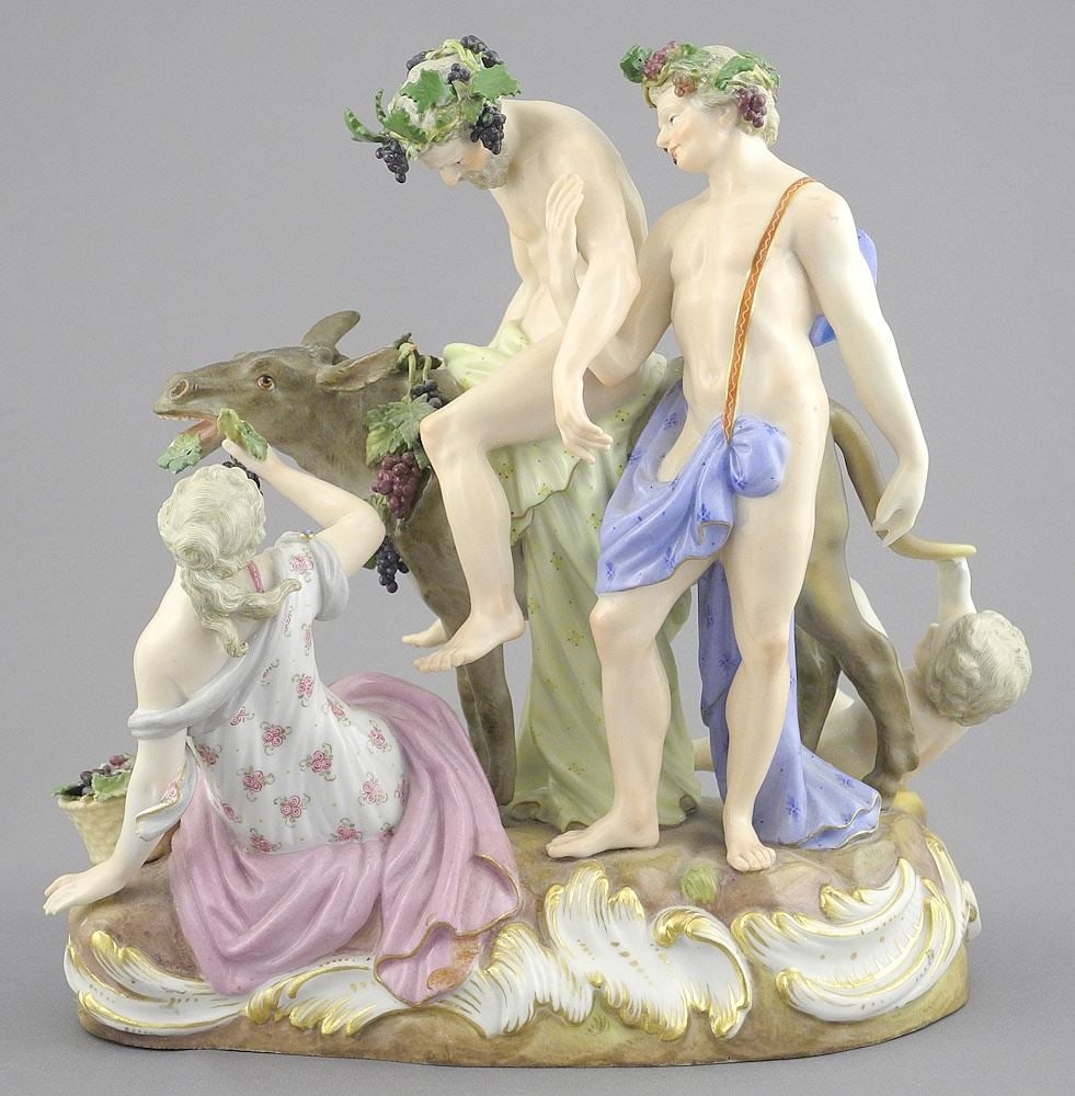 Meissen Porcelain Bacchanalian Figure, 8" x 8 1/4" x 6".: Meissen Porcelain Bacchanalian Figure, 8" x 8 1/4" x 6".