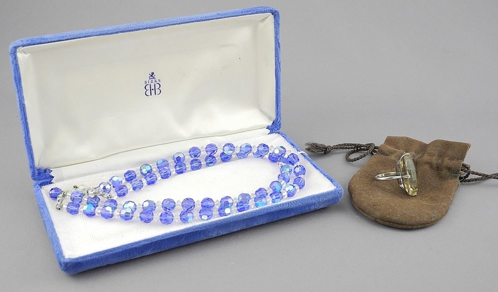 Topaz in Unmarked Silver-Tone Setting (7.82g, Size 4 1/2) with a Blue Crystal Necklace.: Topaz in Unmarked Silver-Tone Setting (7.82g, Size 4 1/2) with a Blue Crystal Necklace.