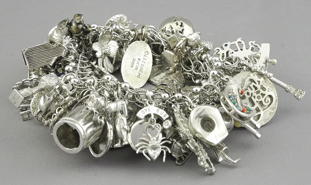 Sterling Silver Charm Bracelet (marked STG) with Various Sterling & Other Charms, 235g. (1 of 3)