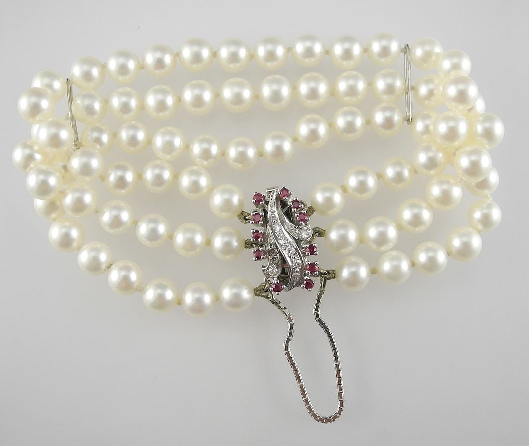 Triple Strand Pearl Bracelet with 18K Diamond & Ruby Clasp. (1 of 3)