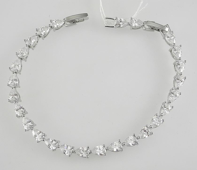 Platinum Plated 0.5c Pear Cut Tennis Bracelet, 7" - 8"L.: Platinum Plated 0.5c Pear Cut Tennis Bracelet, 7" - 8"L.