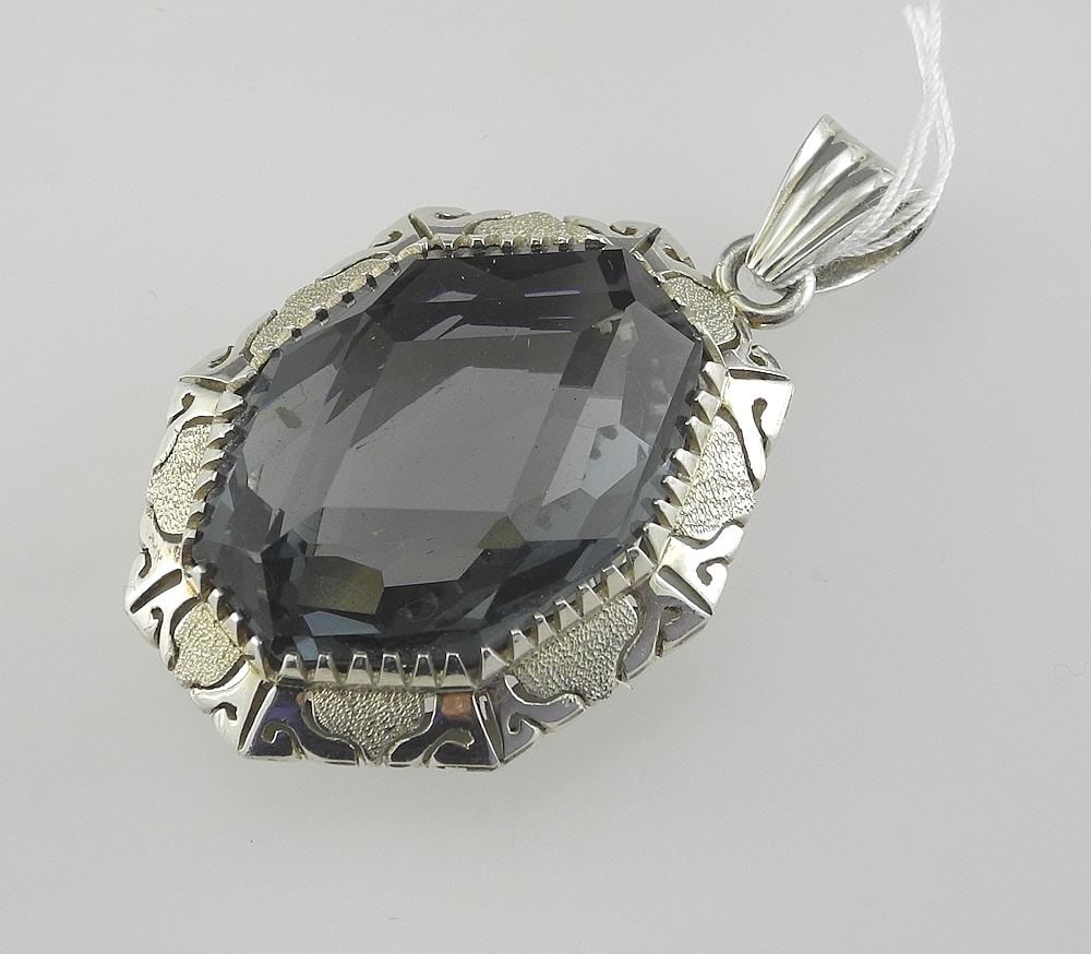 Faceted Blue Stone in Sterling Silver (marked) Setting, 1 7/8"h, 26 g.: Faceted Blue Stone in Sterling Silver (marked) Setting, 1 7/8"h, 26 g.